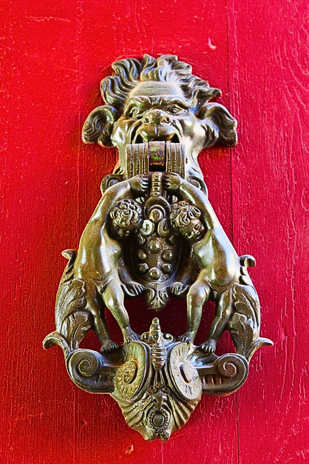 The Knocker on Red Door