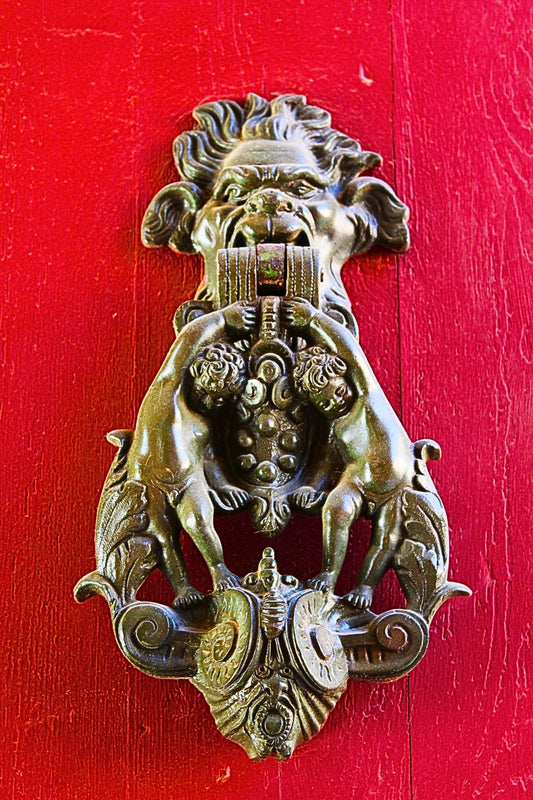 The Knocker on Red Door
